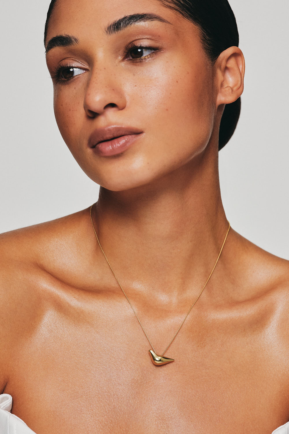 Custom Necklaces Bird Girl Pendant, yellow gold for a luxurious style