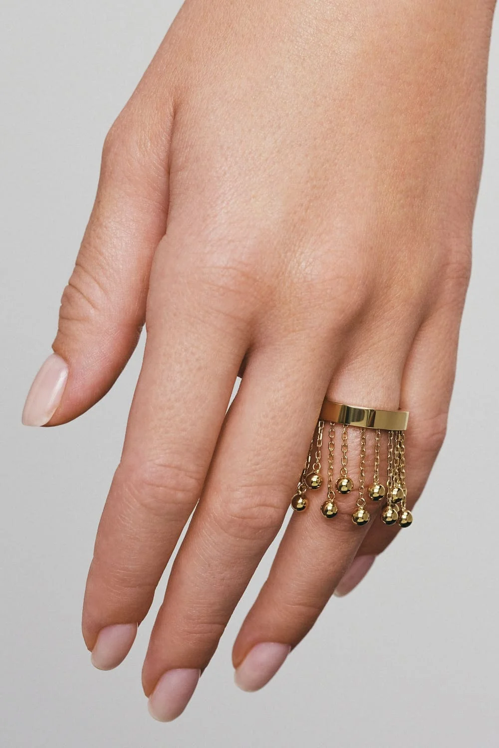 Rings Orbs Chainfall Ring, yellow gold available online with expert craftsmanship