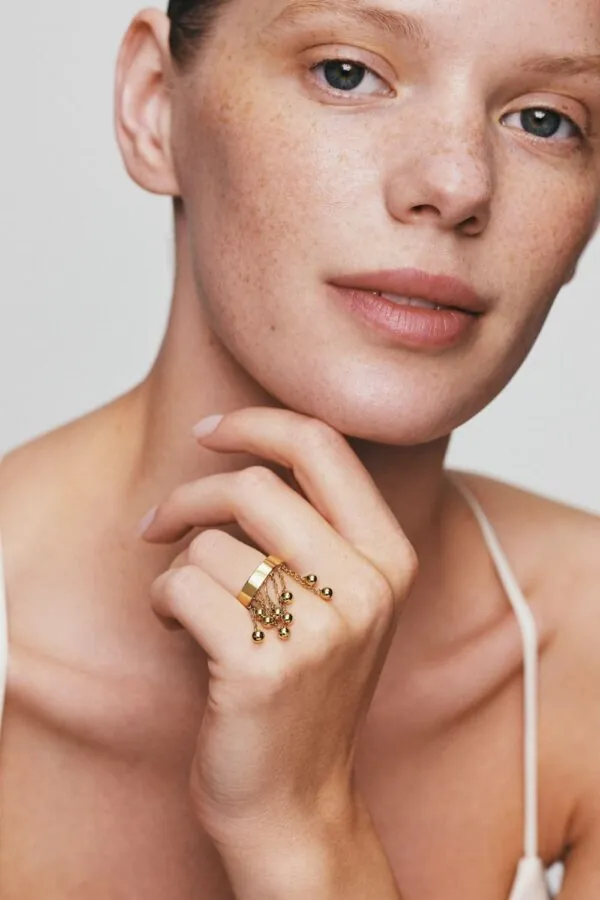 Rings Orbs Chainfall Ring, yellow gold available online with expert craftsmanship