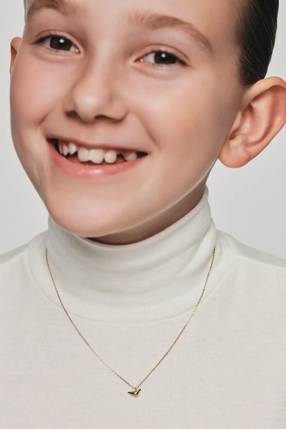 Exclusive Necklaces Mini Bird Girl Pendant, yellow gold from Guzema