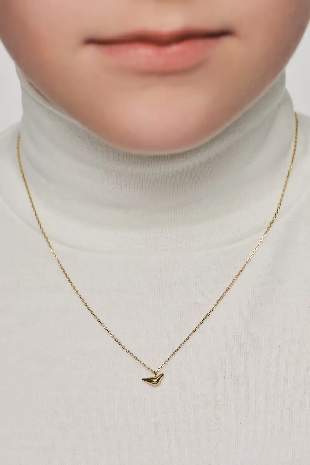 Exclusive Necklaces Mini Bird Girl Pendant, yellow gold from Guzema